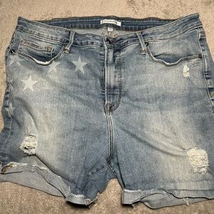 Good American Distressed Denim Shorts with Star Accents